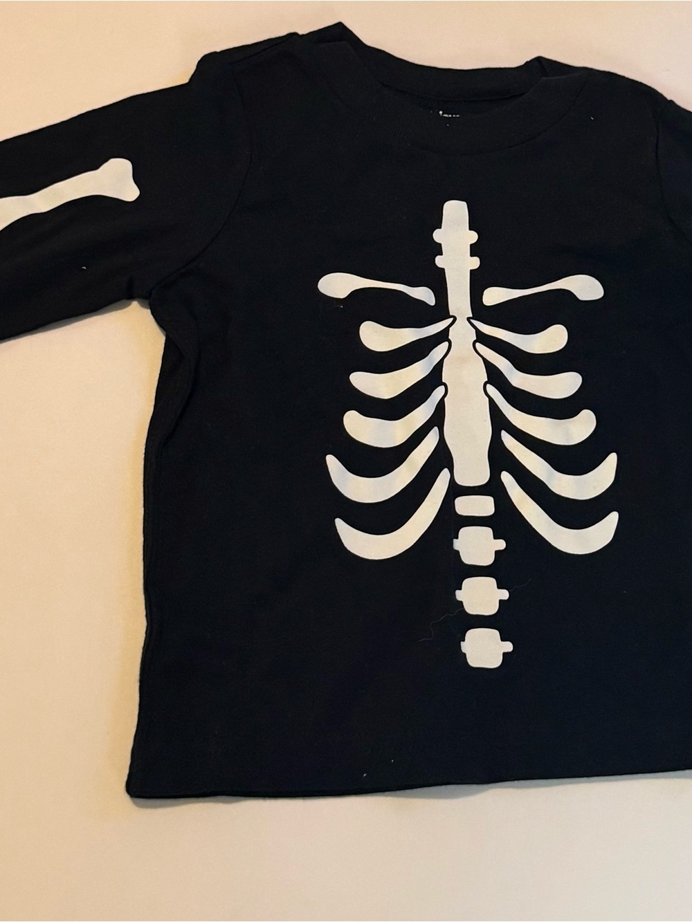 12M Simple Joys by Carters black skeleton long sleeve